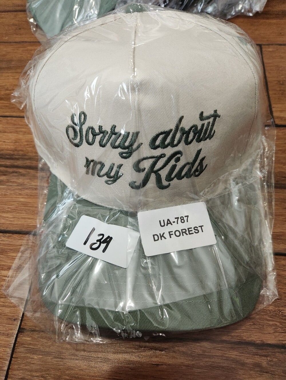 Sorry About My Kids Embroidered Trucker Hat - Cream & Dark Forest